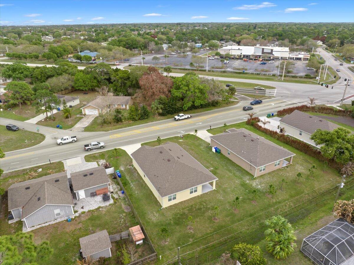 1072 Roseland Road Sebastian, FL 32958 - Photo 42 of 47 an aerial view of residential houses with outdoor space and city view