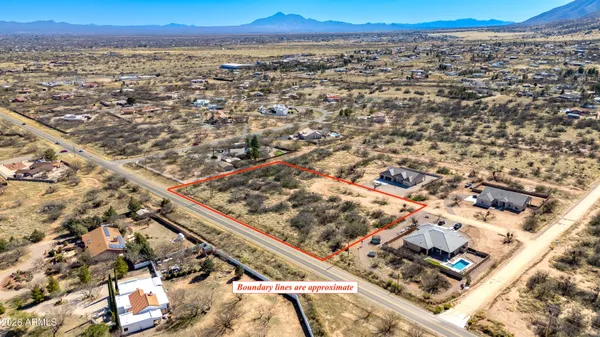 an aerial view of residential building and street