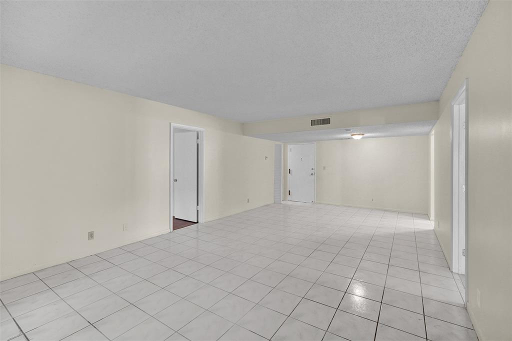 4218 Inverrary Boulevard, Unit 95B Lauderhill, FL 33319 - Photo 12 of 36 a view of an empty room and window