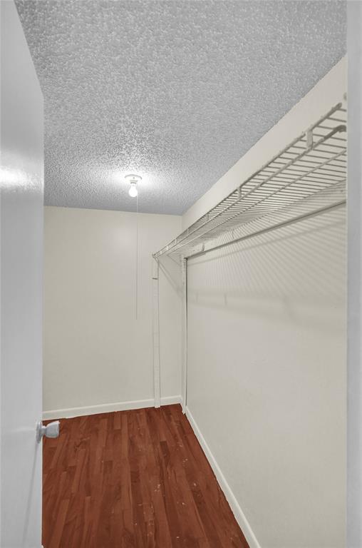 4218 Inverrary Boulevard, Unit 95B Lauderhill, FL 33319 - Photo 19 of 36 a view of a room with wooden floor