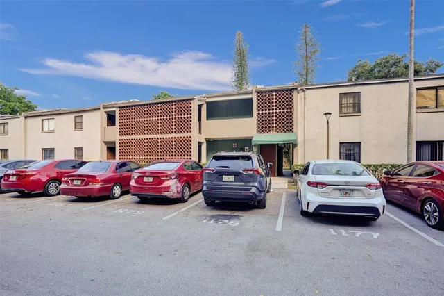 a view of a backyard with a small pool