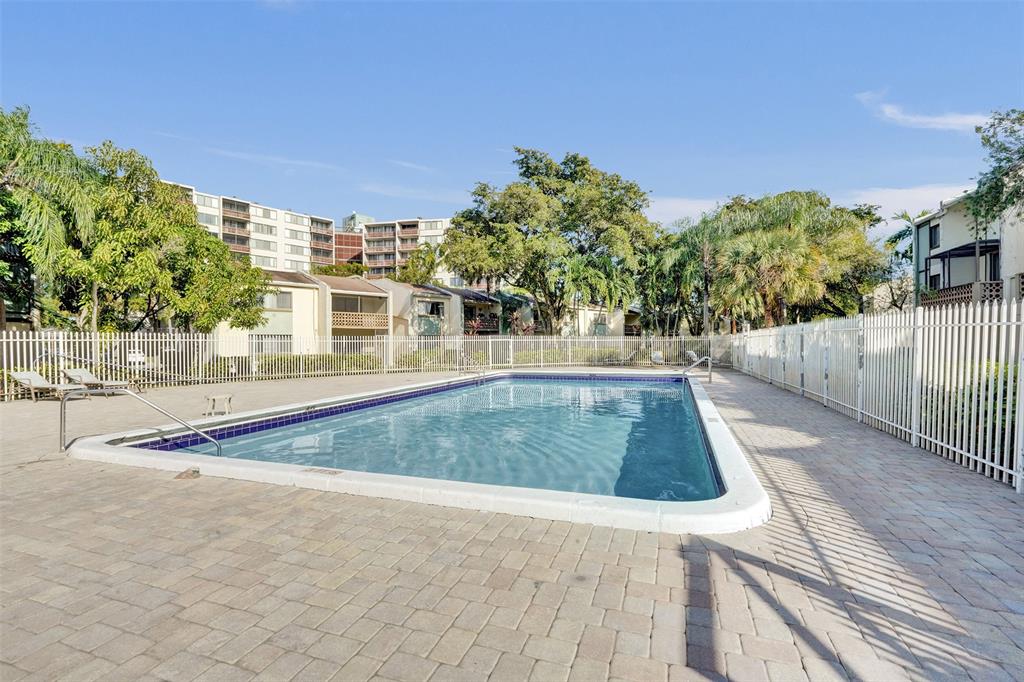 4218 Inverrary Boulevard, Unit 95B Lauderhill, FL 33319 - Photo 34 of 36 a view of outdoor space deck and tree