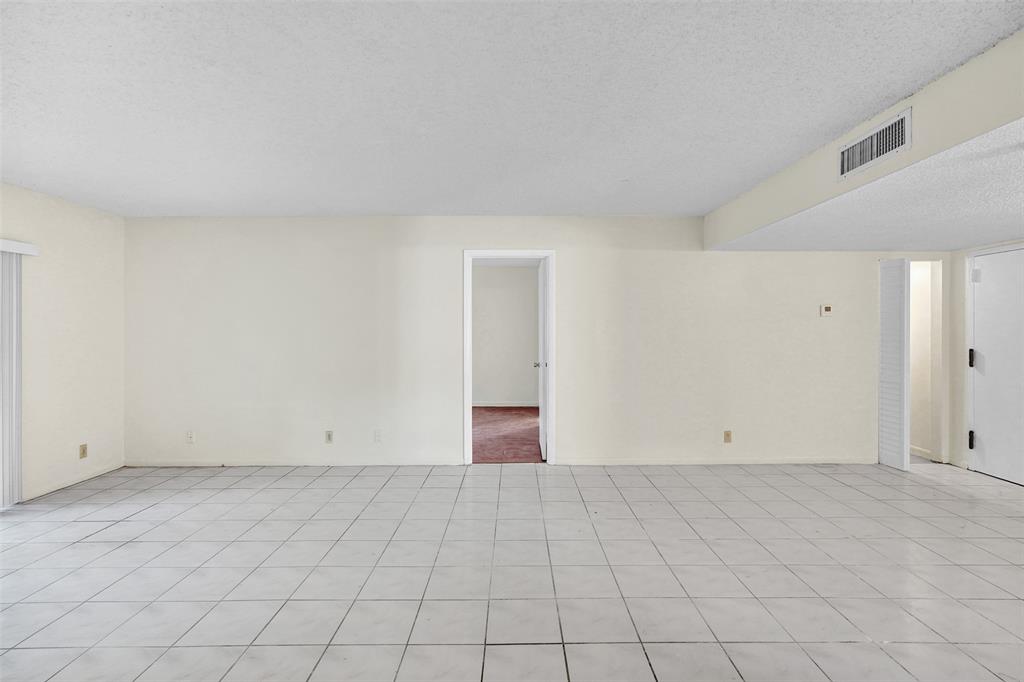 4218 Inverrary Boulevard, Unit 95B Lauderhill, FL 33319 - Photo 9 of 36 a view of an empty room