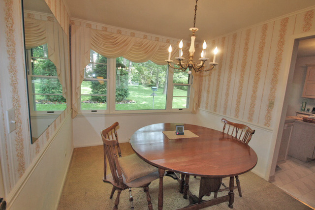 314 Banbury Road Mundelein, IL 60060 - Photo 3 of 17 a view of a dining room with furniture window and outside view