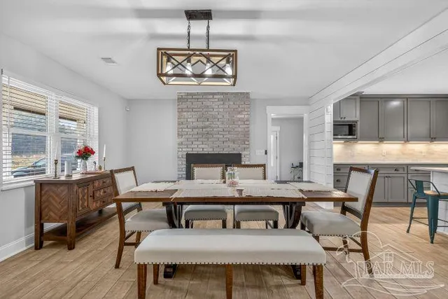 a view of a dining room with furniture