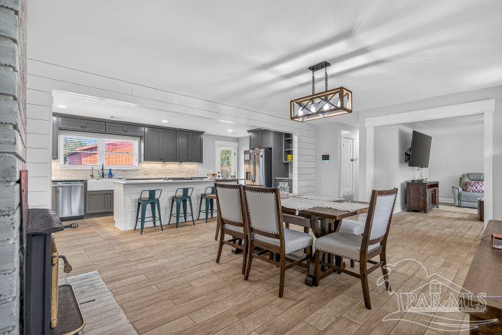 8940 Indian Ford Road Milton, FL 32570 - Photo 20 of 54 a view of a dining room with furniture