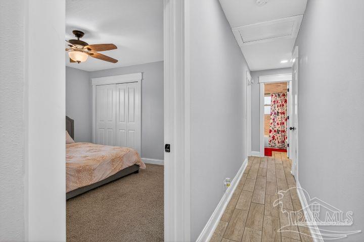 8940 Indian Ford Road Milton, FL 32570 - Photo 38 of 54 a bedroom with a bed and a window