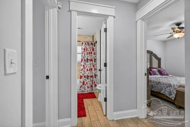 a bedroom with a bed and a cabinets