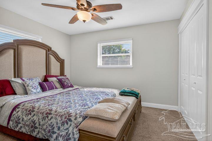 8940 Indian Ford Road Milton, FL 32570 - Photo 46 of 54 a bedroom with bed and window