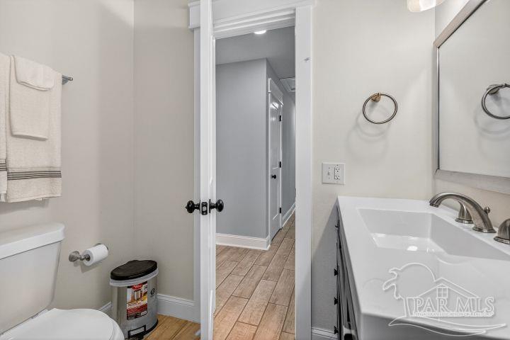 8940 Indian Ford Road Milton, FL 32570 - Photo 51 of 54 a bathroom with a sink toilet and shower