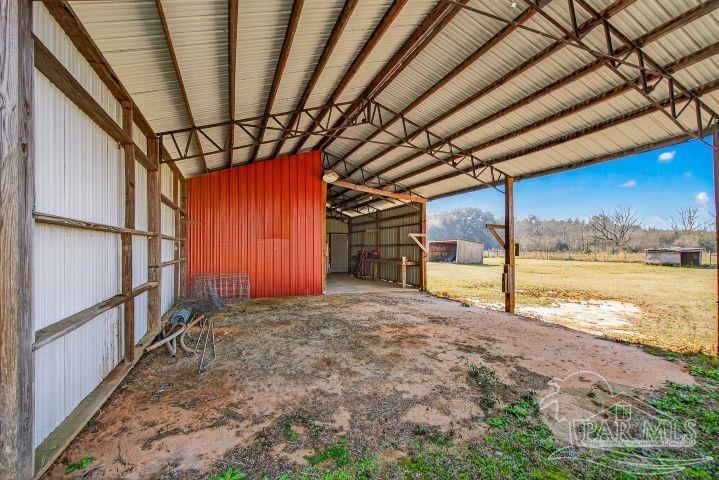 8940 Indian Ford Road Milton, FL 32570 - Photo 8 of 54 a view of an empty room with a window