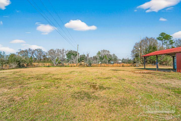 8940 Indian Ford Road Milton, FL 32570 - Photo 10 of 54 a view of an ocean and a building