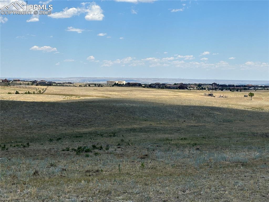 Goodson Road Peyton, CO 80831 - Photo 6 of 9 a view of an ocean and beach