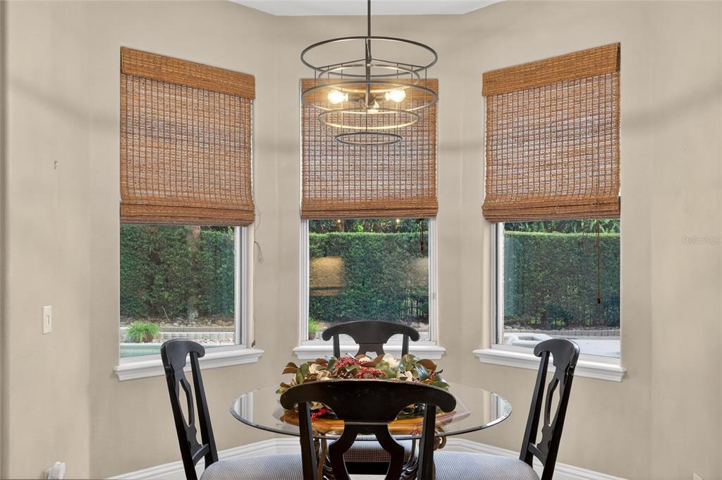 248 Maison Court Altamonte Springs, FL 32714 - Photo 17 of 88 a dining room with furniture and window