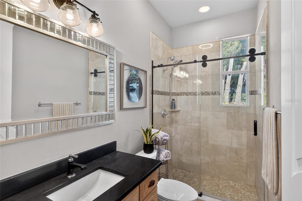 248 Maison Court Altamonte Springs, FL 32714 - Photo 46 of 88 a bathroom with a sink mirror toilet and shower