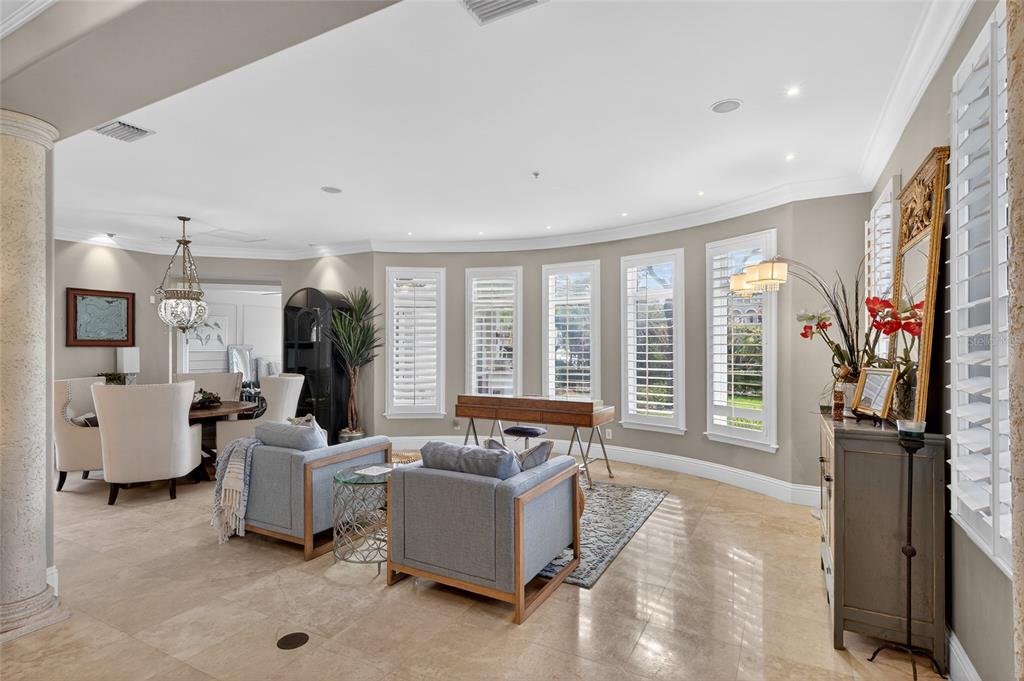 248 Maison Court Altamonte Springs, FL 32714 - Photo 6 of 88 a living room with furniture and a large window
