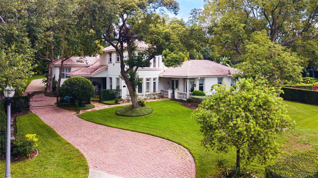 248 Maison Court Altamonte Springs, FL 32714 - Photo 71 of 88 a front view of a house with garden