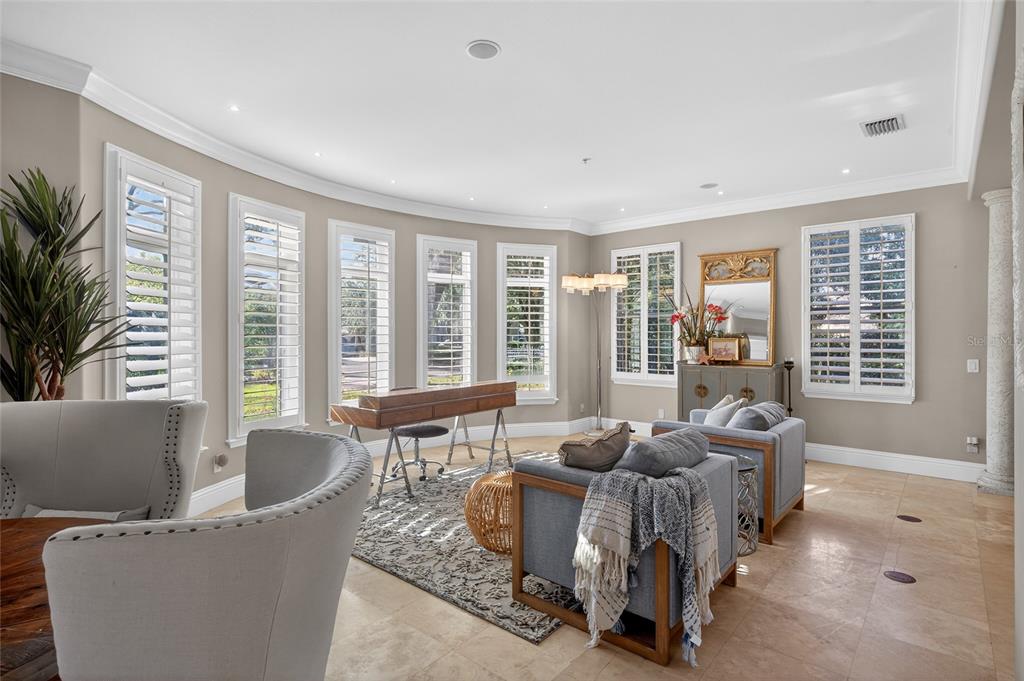 248 Maison Court Altamonte Springs, FL 32714 - Photo 8 of 88 a living room with furniture and windows