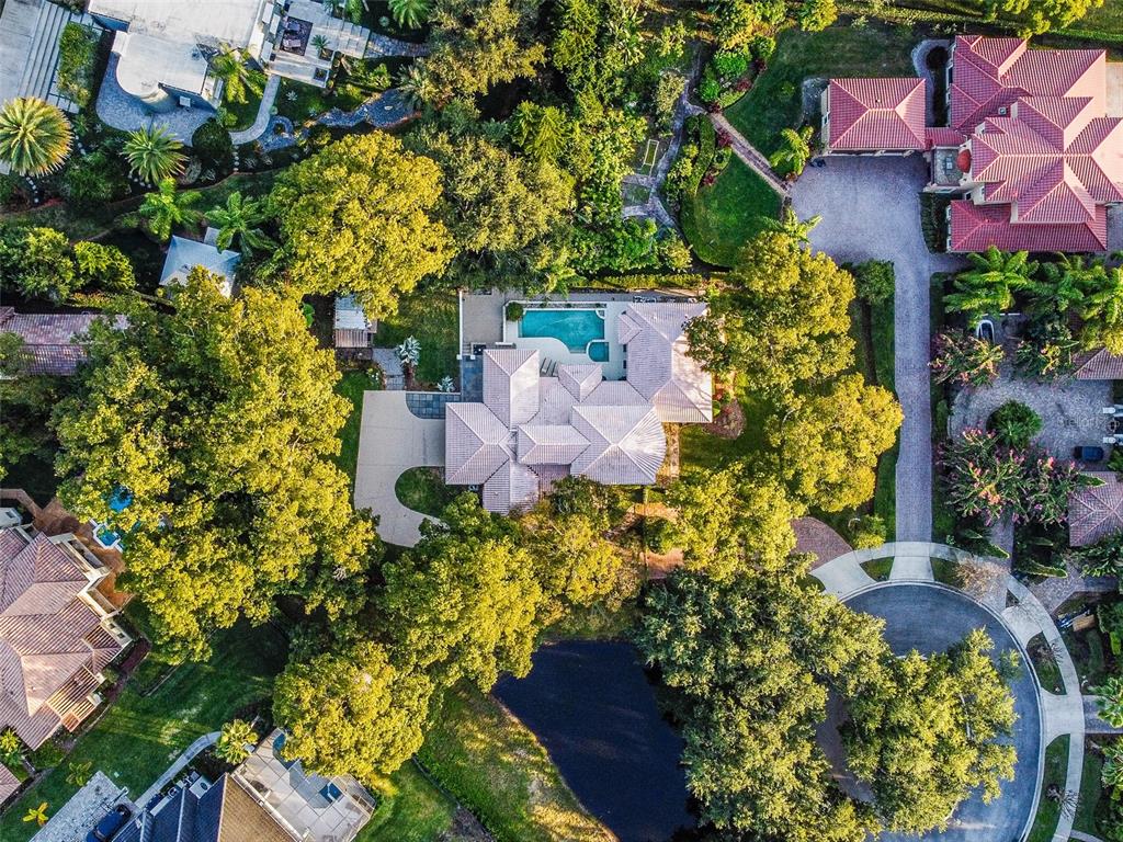 248 Maison Court Altamonte Springs, FL 32714 - Photo 84 of 88 an aerial view of a house with a yard and garden