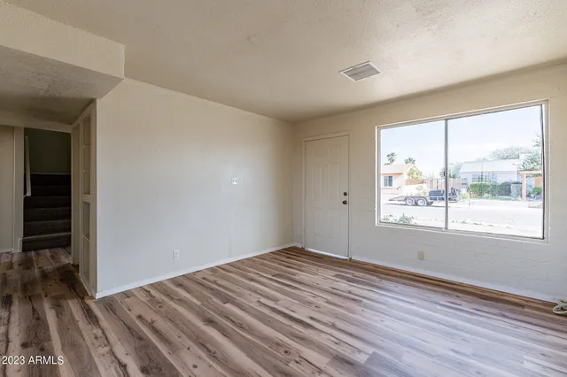 a room with wooden cabinets