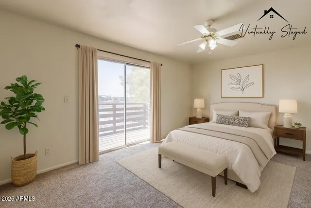 a bedroom with a bed and a potted plant