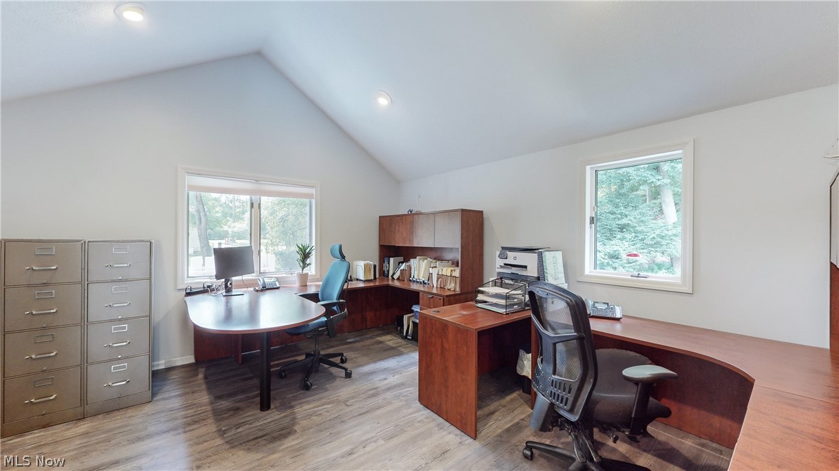 3700 Chagrin River Road Chagrin Falls, OH 44022 - Photo 26 of 43 First floor Office/bedroom featuring light hardwood / wood-style flooring and high vaulted ceiling