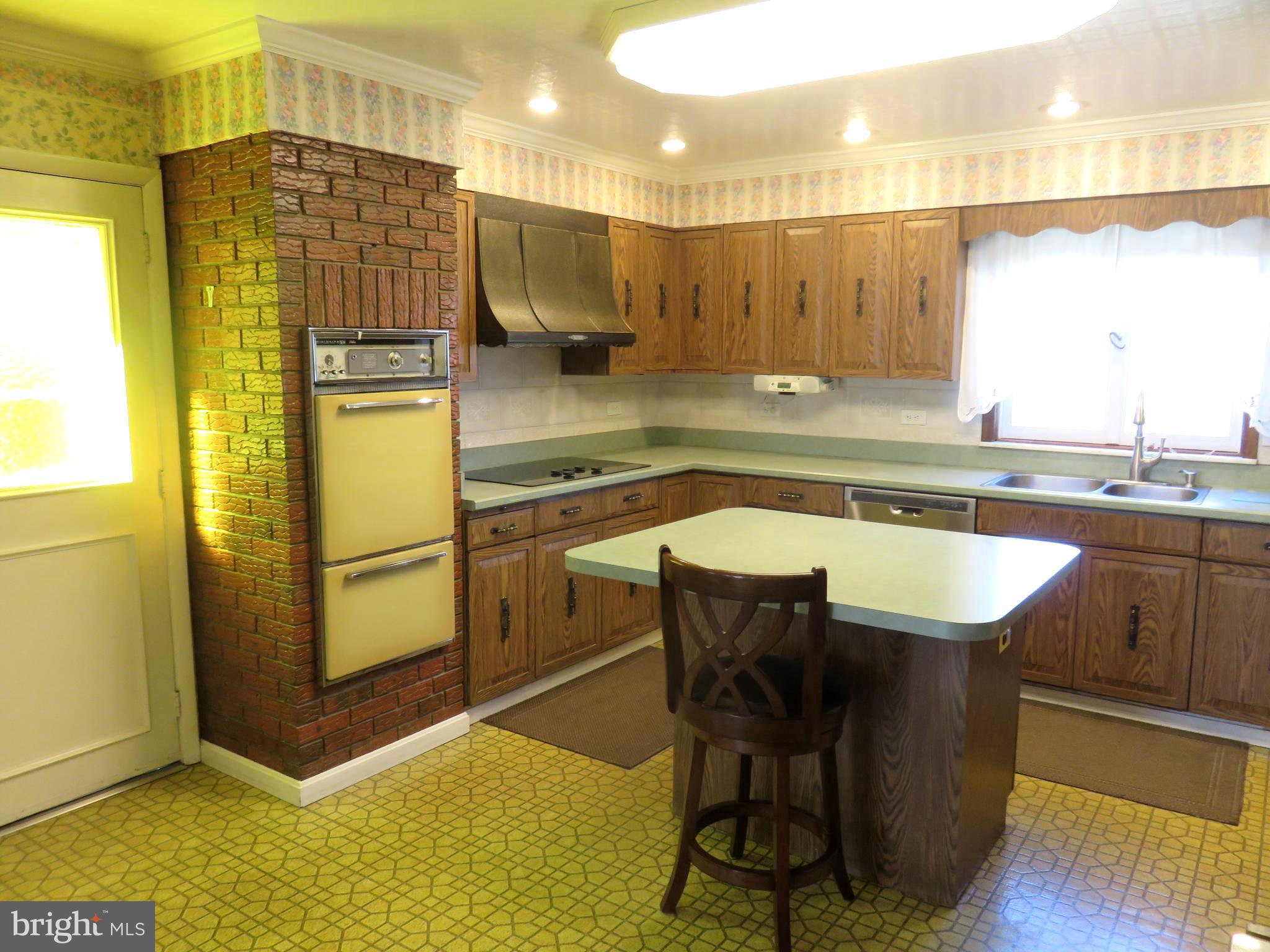 1710 Orlando Road Baltimore, MD 21234 - Photo 8 of 32 a kitchen with a sink appliances and cabinets