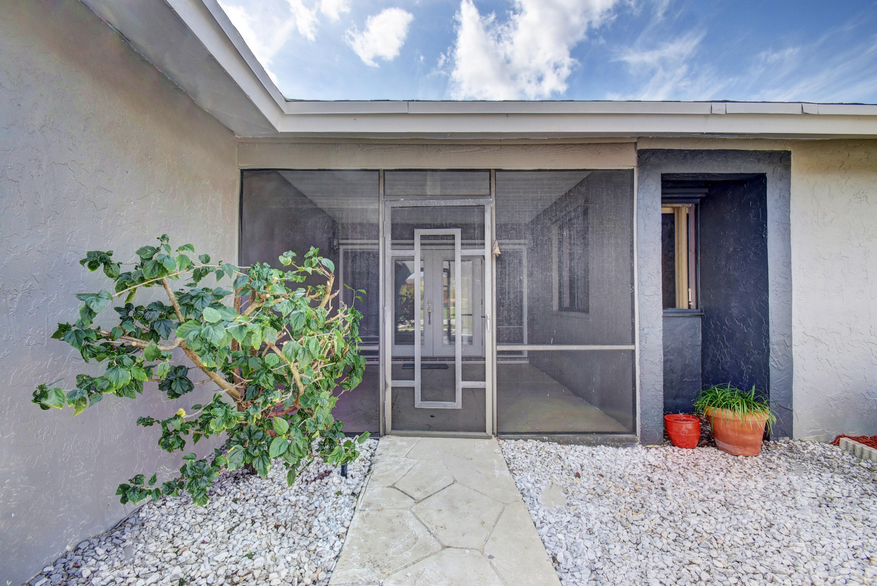4574 Brandywine Drive Boca Raton, FL 33487 - Photo 4 of 37 Screened Entry
