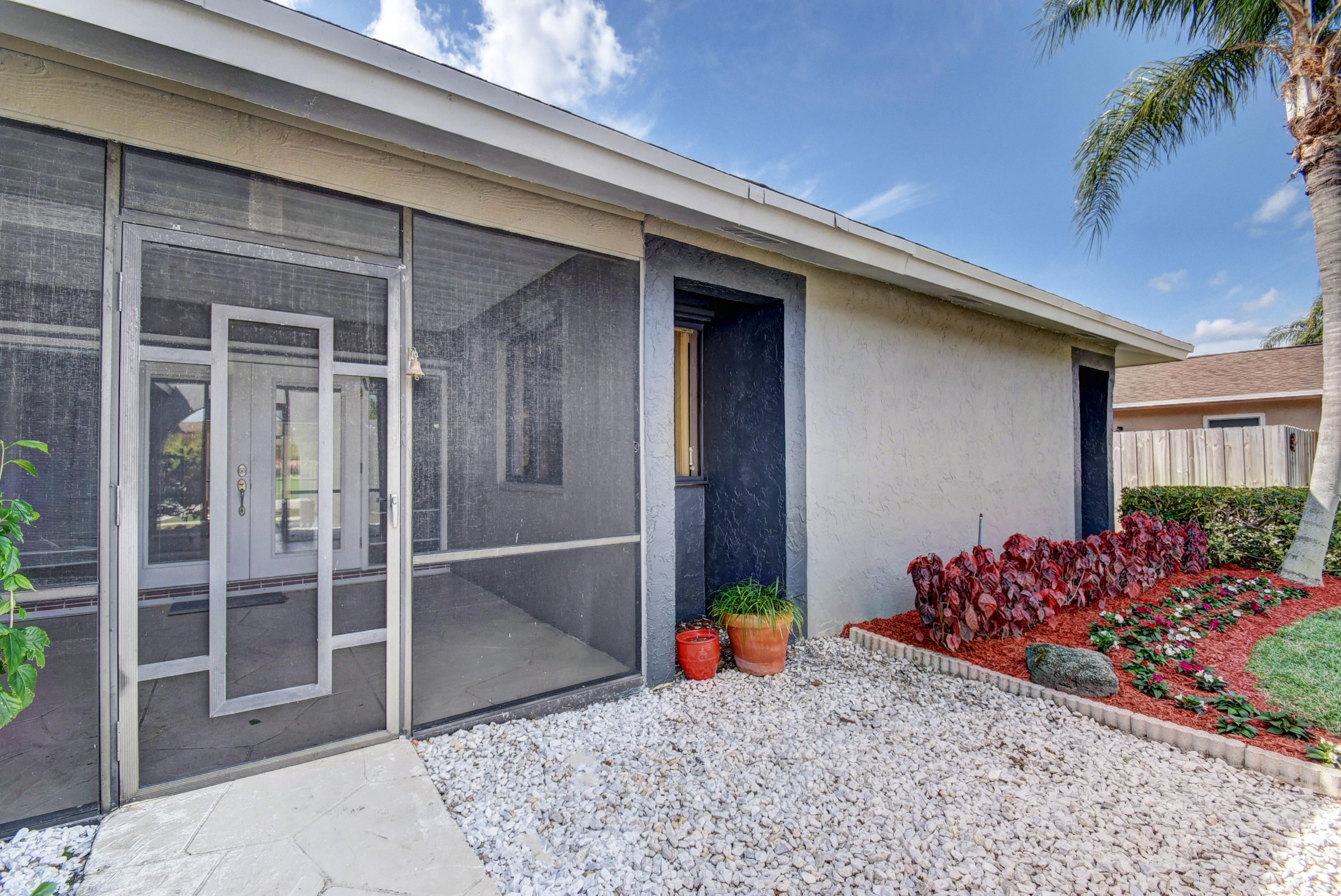 4574 Brandywine Drive Boca Raton, FL 33487 - Photo 5 of 37 Front/side