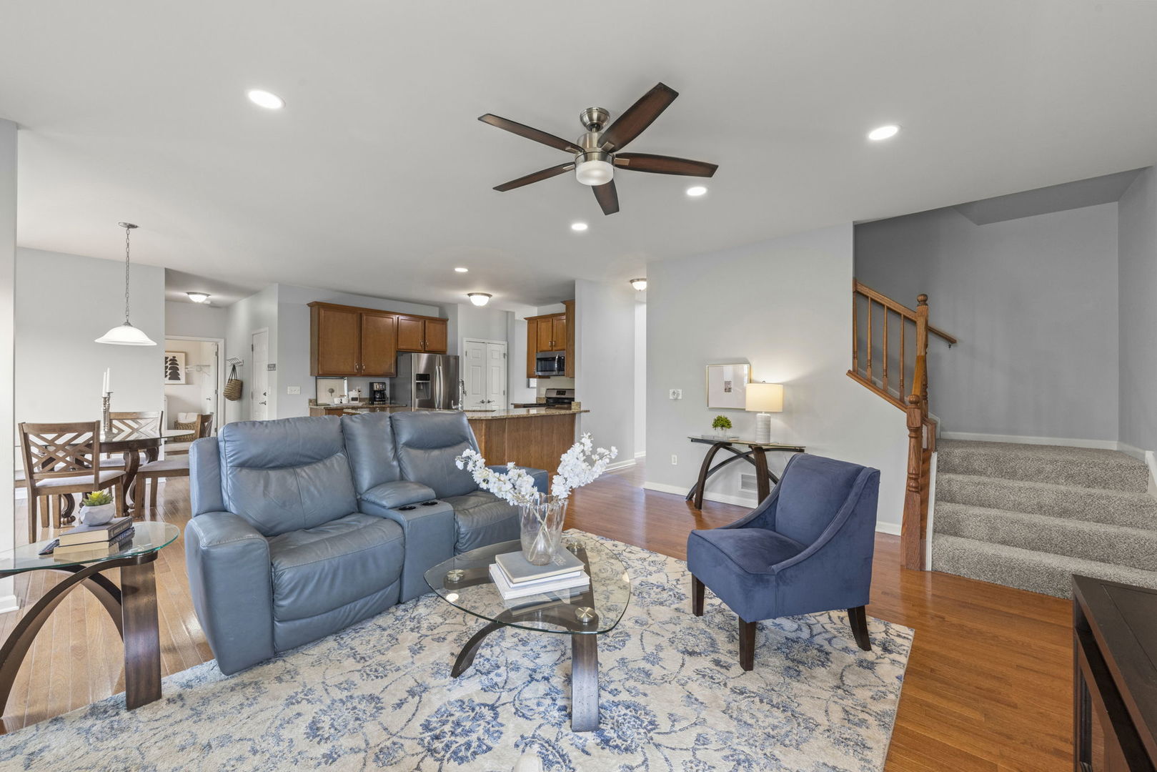 40W210 Palmer Road Geneva, IL 60134 - Photo 6 of 28 a living room with furniture kitchen view and a chandelier