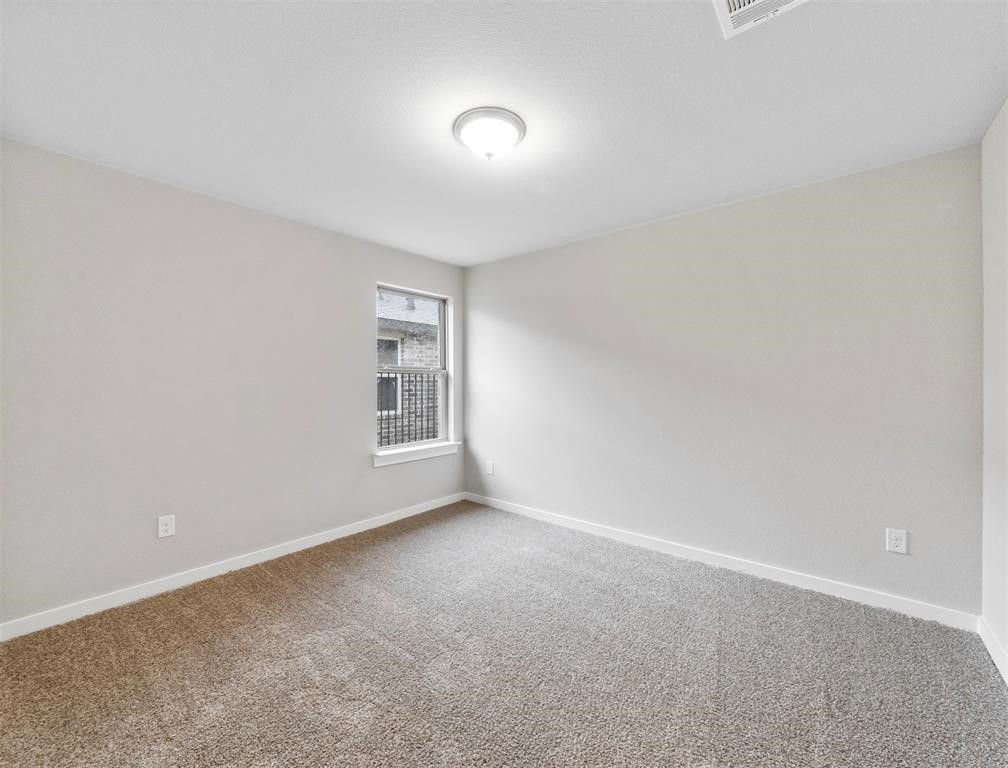 7922 Brumbly Lane Rosharon, TX 77583 - Photo 7 of 17 a view of an empty room with a window