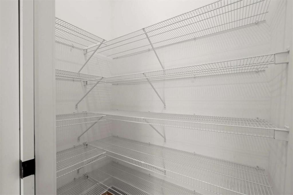 326 Treble Way Alpharetta, GA 30009 - Photo 12 of 47 a view of an empty walk in closet