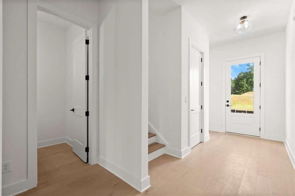 326 Treble Way Alpharetta, GA 30009 - Photo 13 of 47 a view of a room with wooden floor