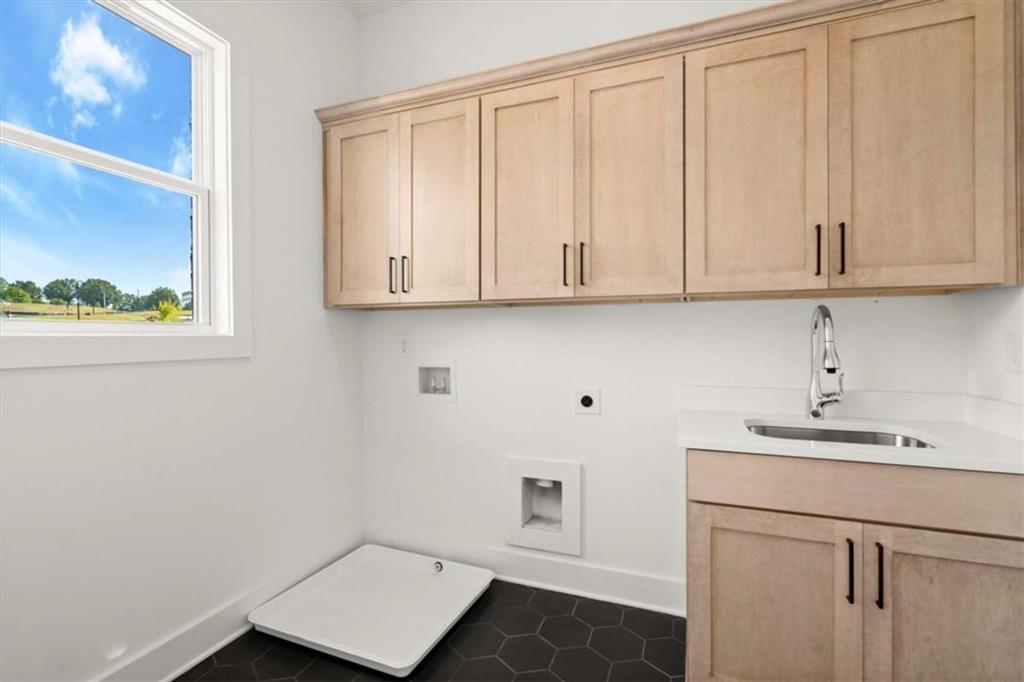 326 Treble Way Alpharetta, GA 30009 - Photo 19 of 47 a room with cabinets