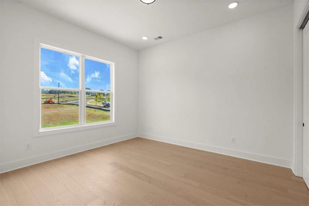326 Treble Way Alpharetta, GA 30009 - Photo 20 of 47 an empty room with a window