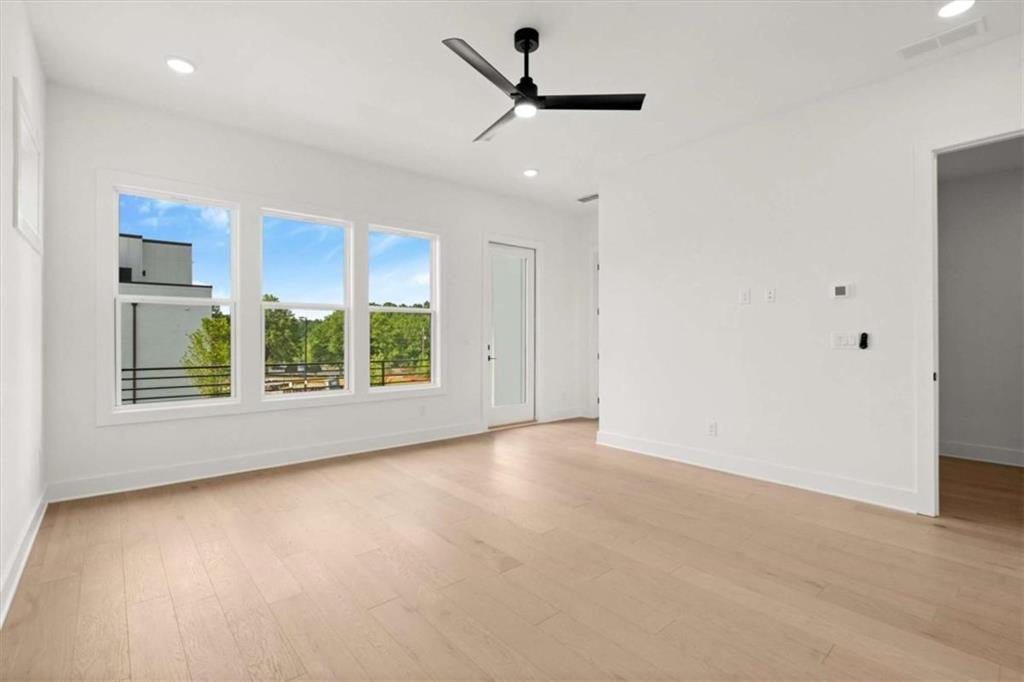326 Treble Way Alpharetta, GA 30009 - Photo 28 of 47 a view of an empty room with a window