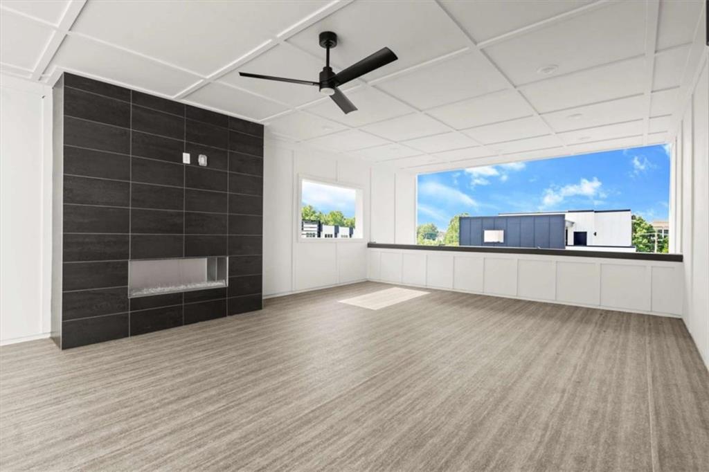 326 Treble Way Alpharetta, GA 30009 - Photo 41 of 47 a view of a room with a wooden floor and a kitchen