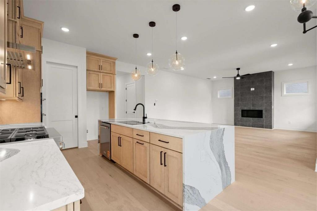 326 Treble Way Alpharetta, GA 30009 - Photo 10 of 47 a kitchen with a sink stove and refrigerator