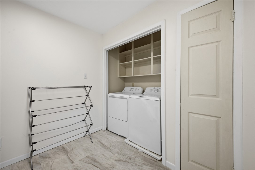 2012 Red River Drive Bryan, TX 77802 - Photo 13 of 23 a utility room with dryer and washer