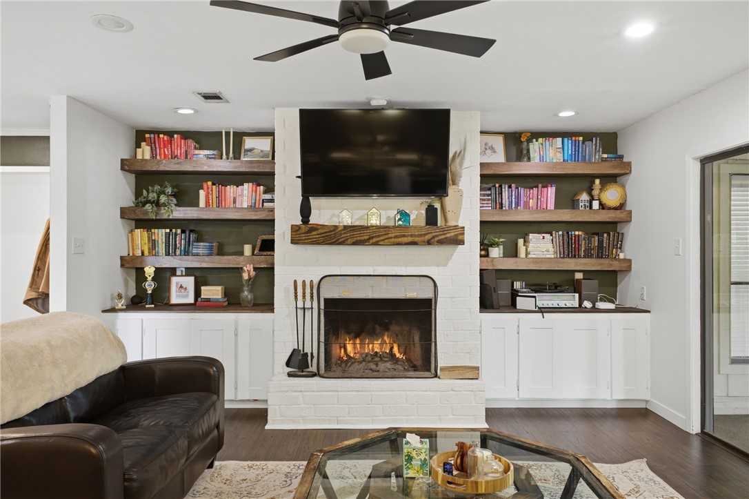 2012 Red River Drive Bryan, TX 77802 - Photo 6 of 23 a living room with furniture and a fireplace