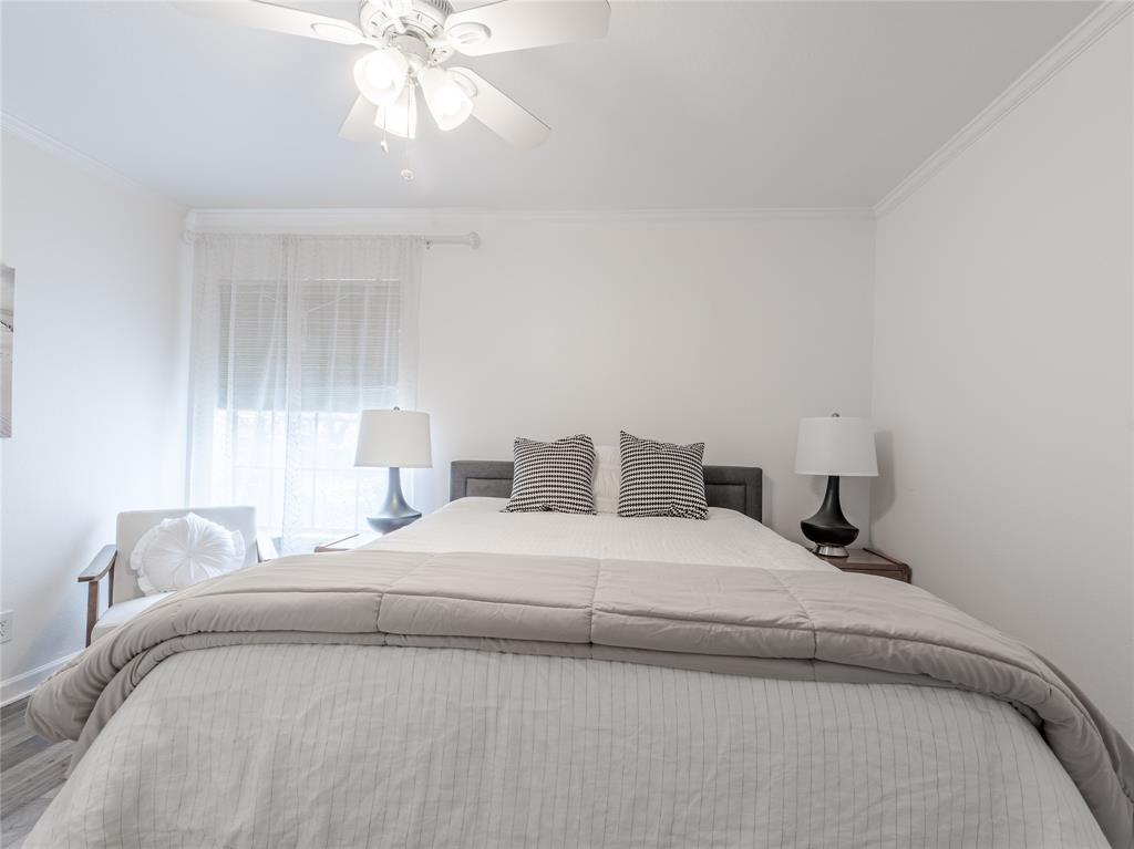 4748 Old Bent Tree Lane, Unit 201 Dallas, TX 75287 - Photo 7 of 17 Bedroom with ornamental molding and a ceiling fan