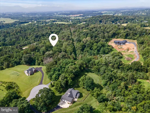 an aerial view of a house with a outdoor space