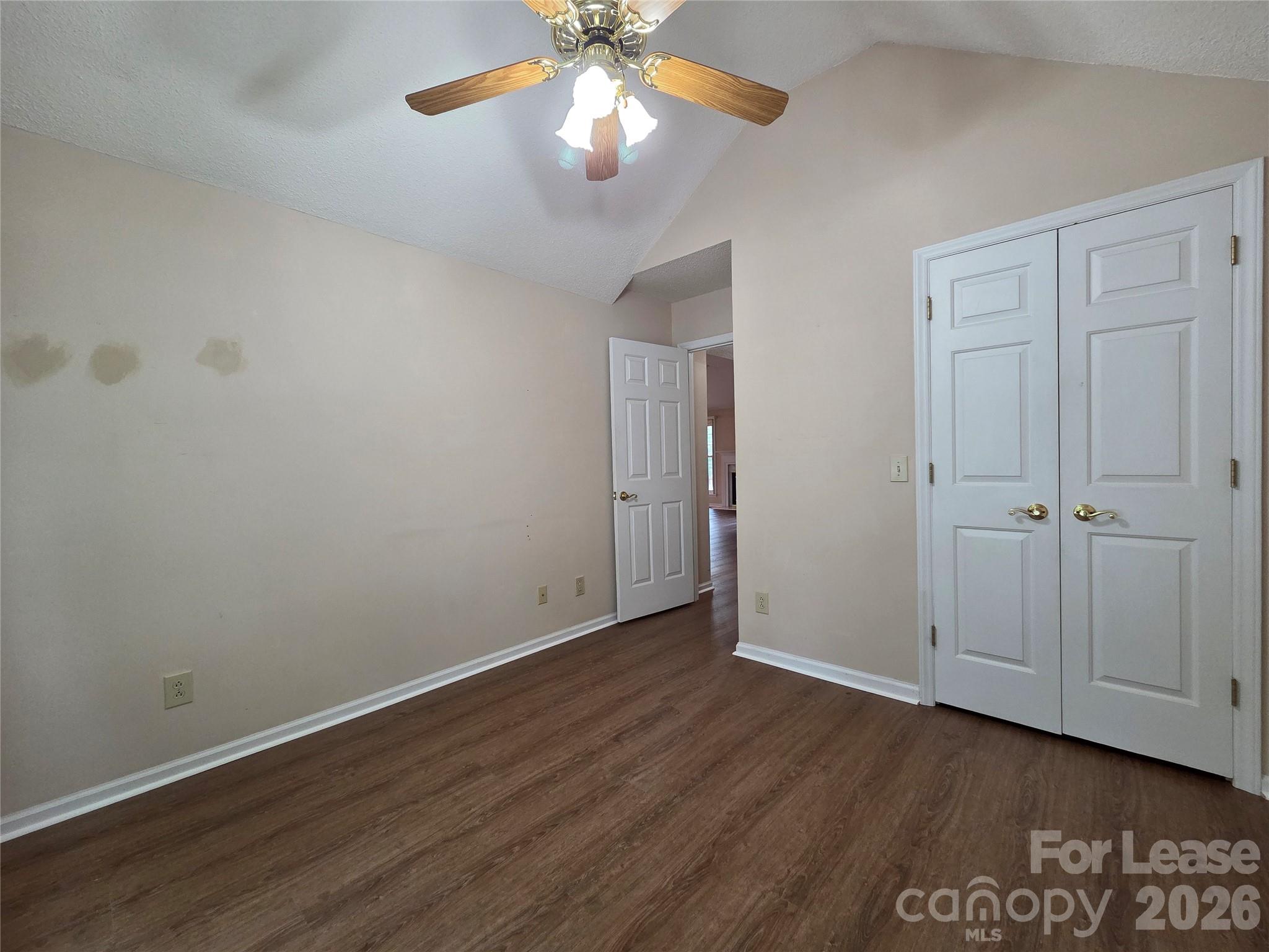 1319 Mistletoe Ridge Place Northwest Concord, NC 28027 - Photo 22 of 35 a view of an empty room with wooden floor