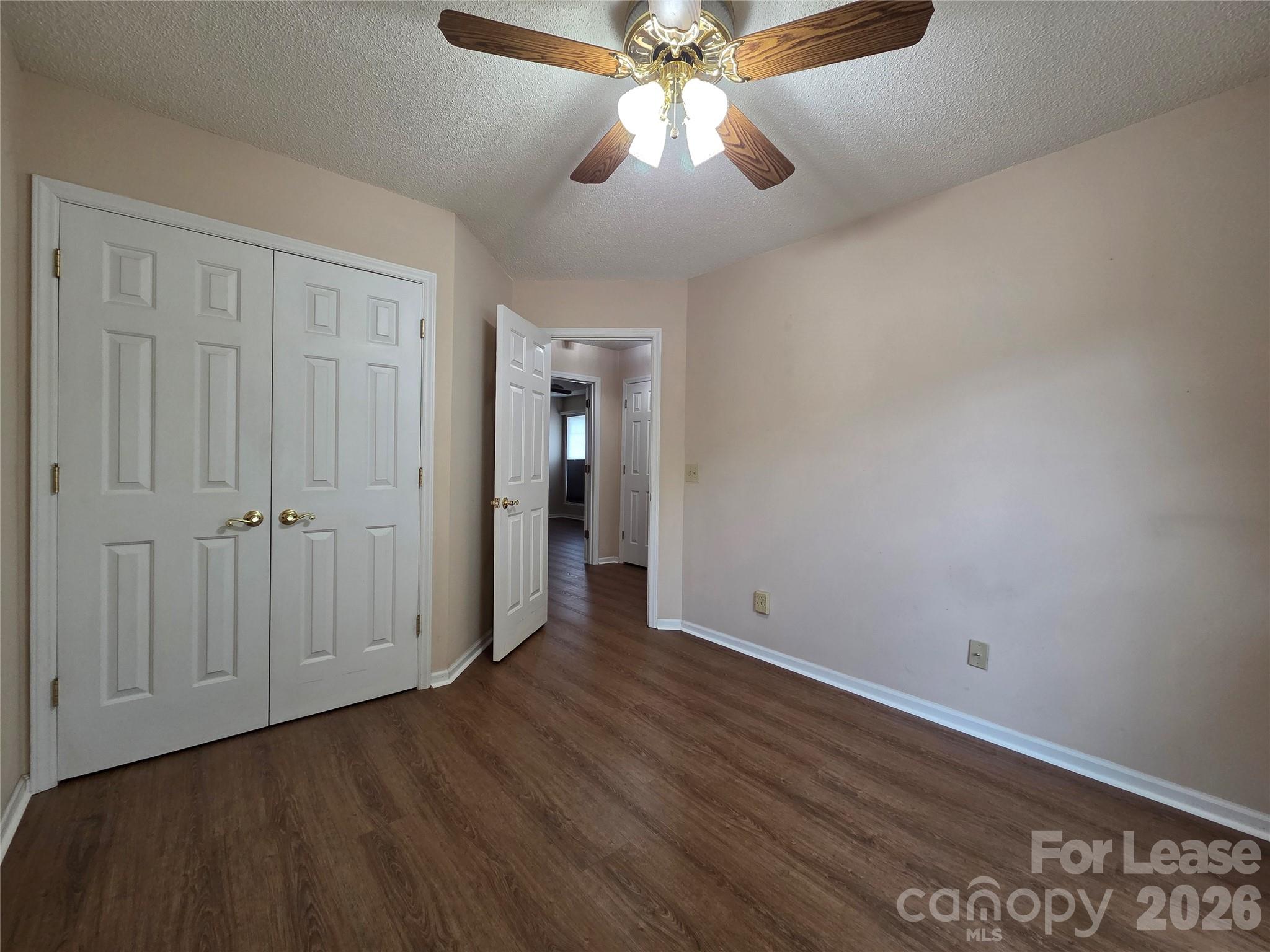 1319 Mistletoe Ridge Place Northwest Concord, NC 28027 - Photo 26 of 35 a view of empty room with wooden floor