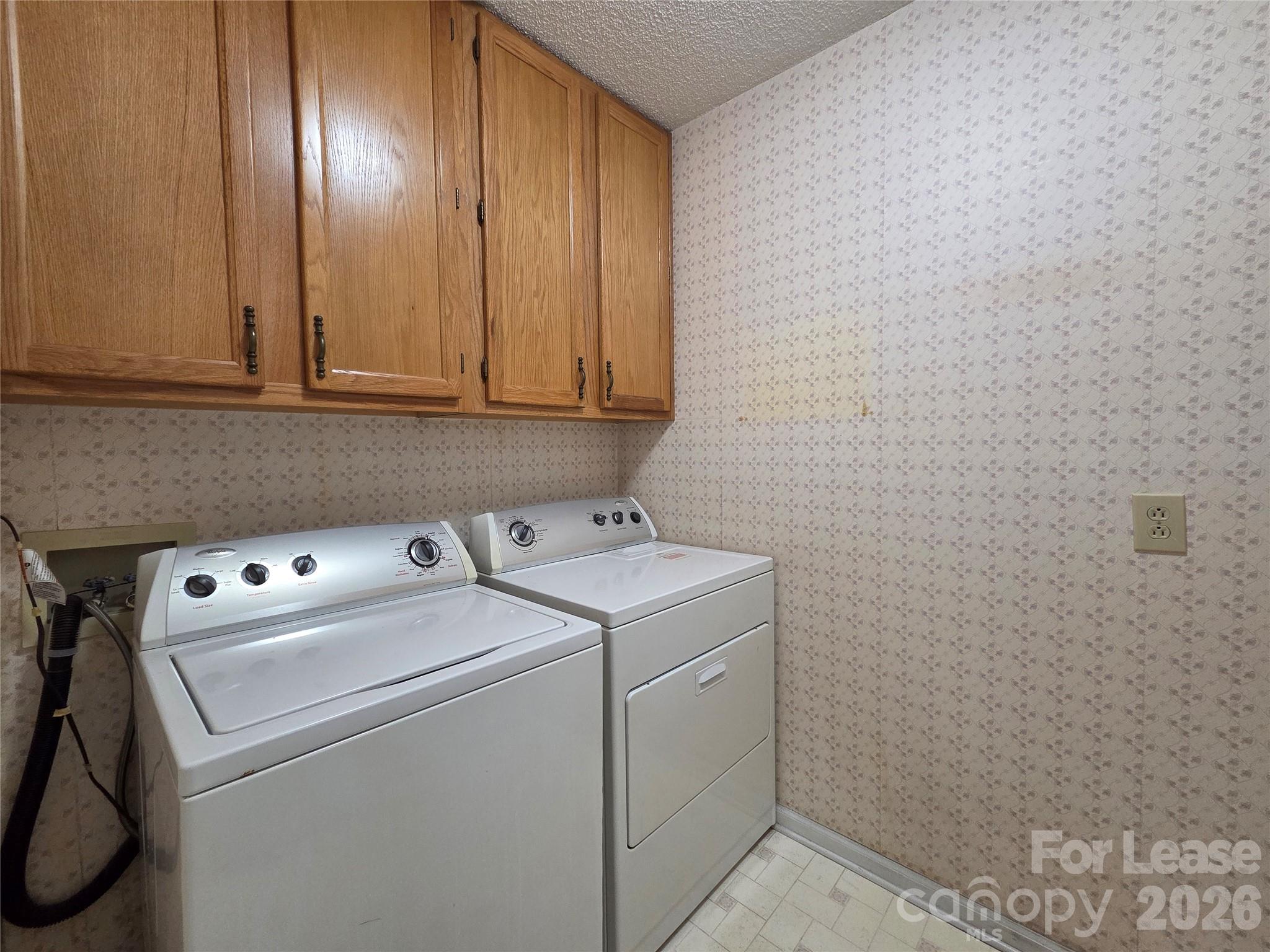 1319 Mistletoe Ridge Place Northwest Concord, NC 28027 - Photo 27 of 35 a utility room with dryer and washer