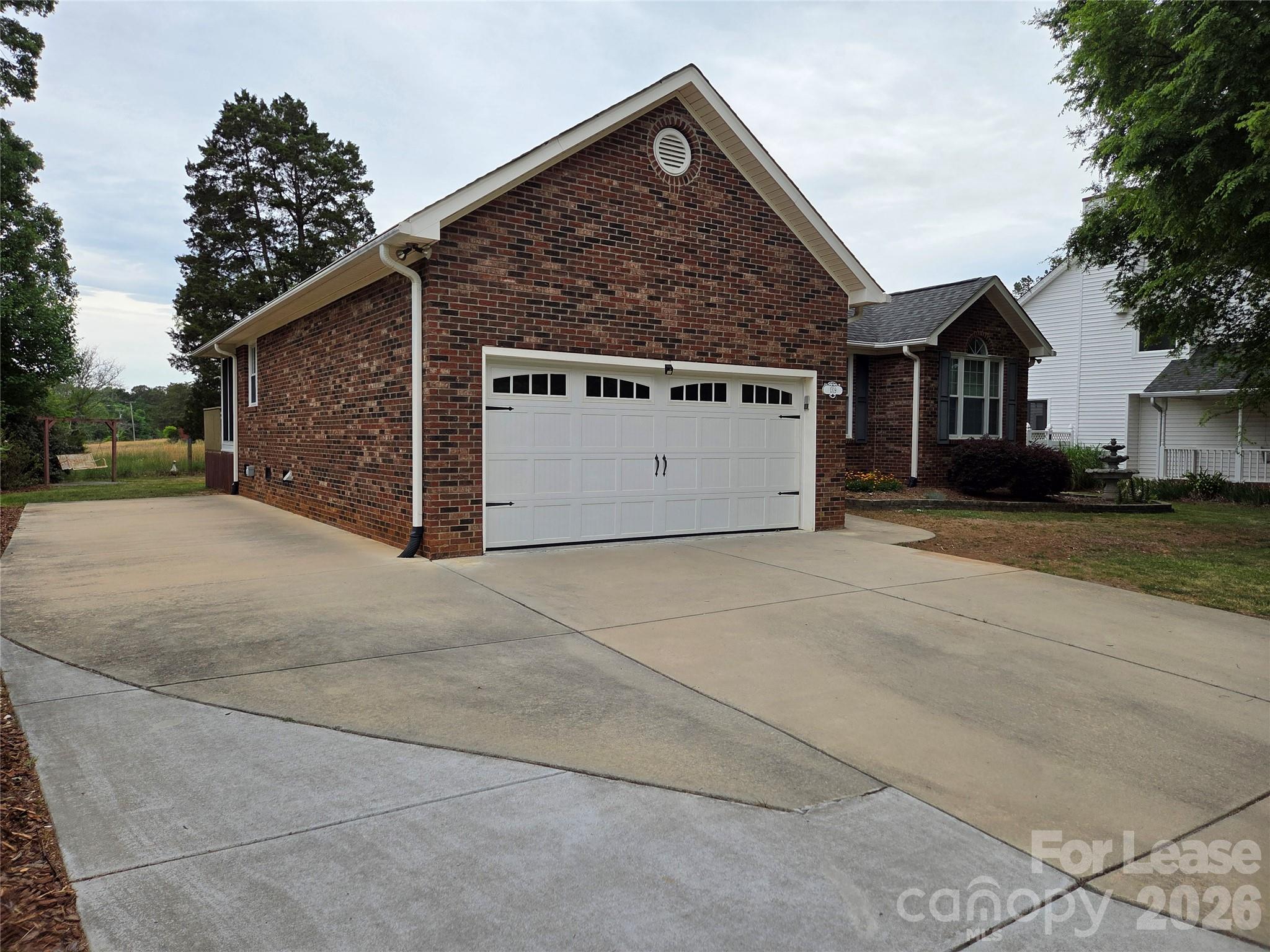 1319 Mistletoe Ridge Place Northwest Concord, NC 28027 - Photo 30 of 35 a view of a house with a outdoor space