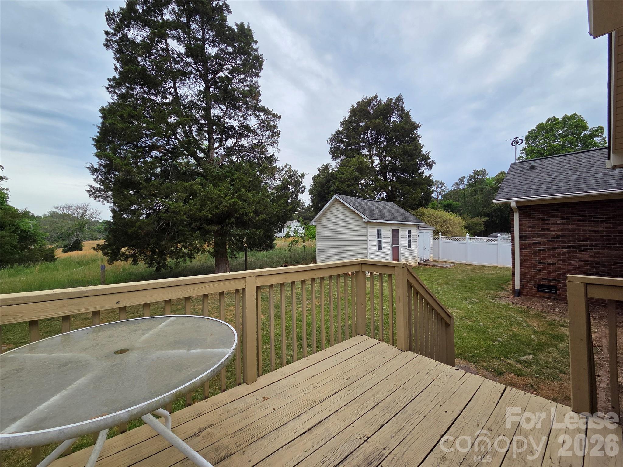 1319 Mistletoe Ridge Place Northwest Concord, NC 28027 - Photo 32 of 35 a view of house with swimming pool and yard