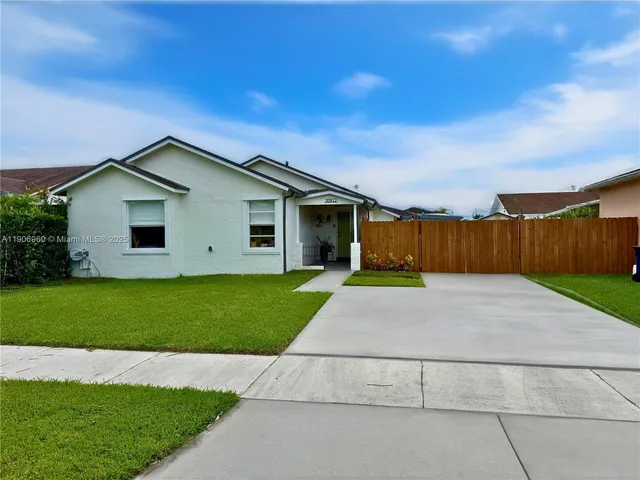 a house view with a garden space