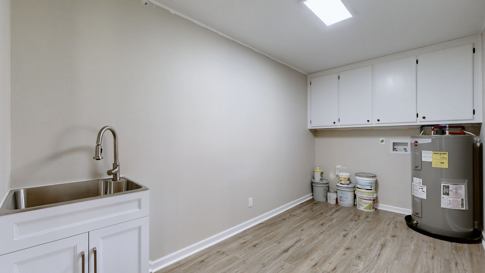 3460 Bradyville Road Readyville, TN 37149 - Photo 11 of 42 a room with a sink and cabinets
