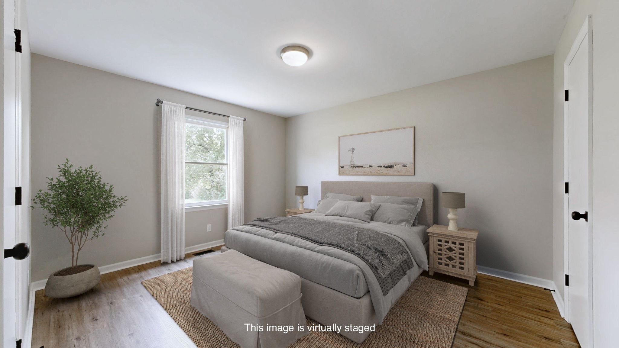 3460 Bradyville Road Readyville, TN 37149 - Photo 13 of 42 a bedroom with a bed and a potted plant